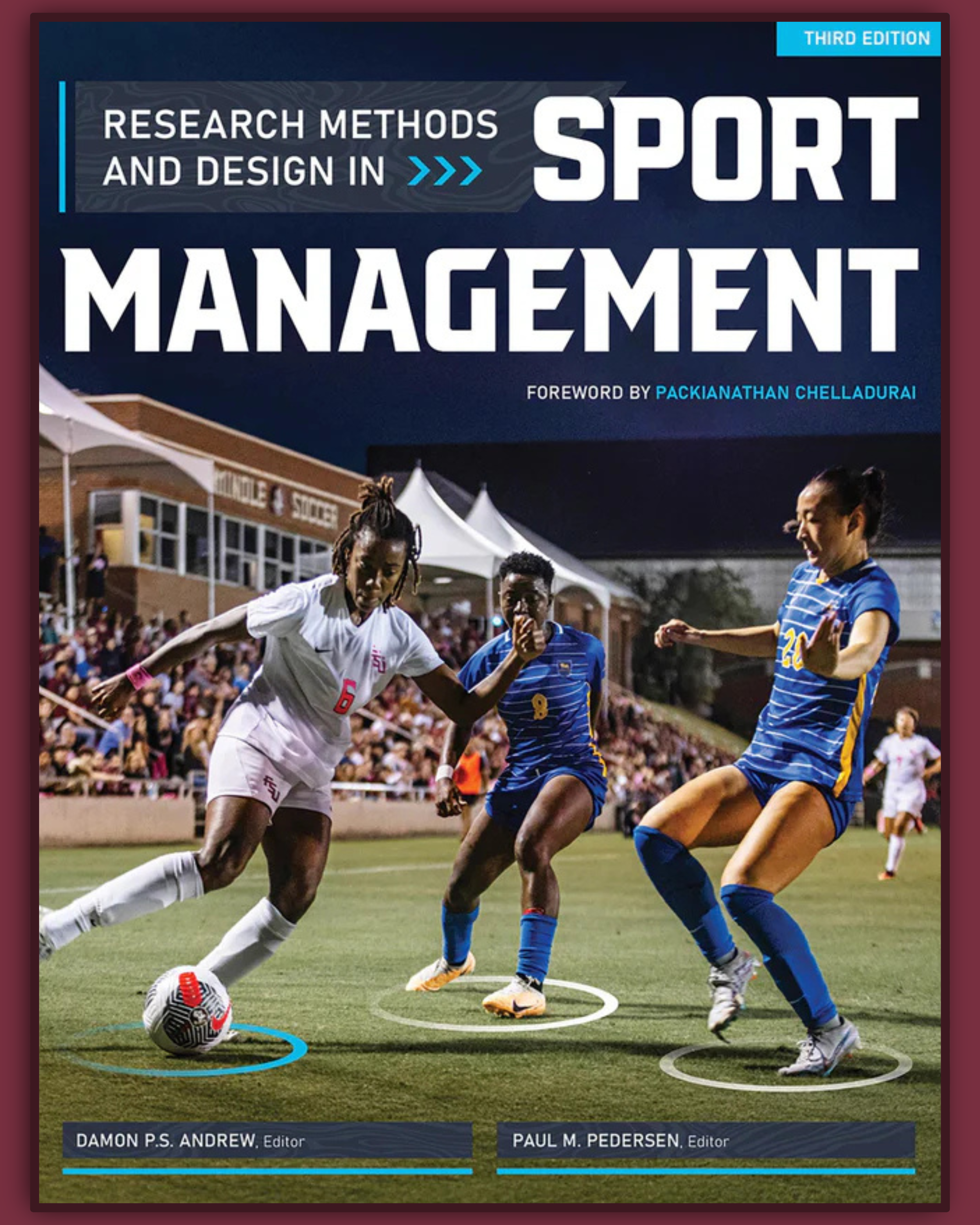 cover of the textbook features the FSU national championship women's soccer team