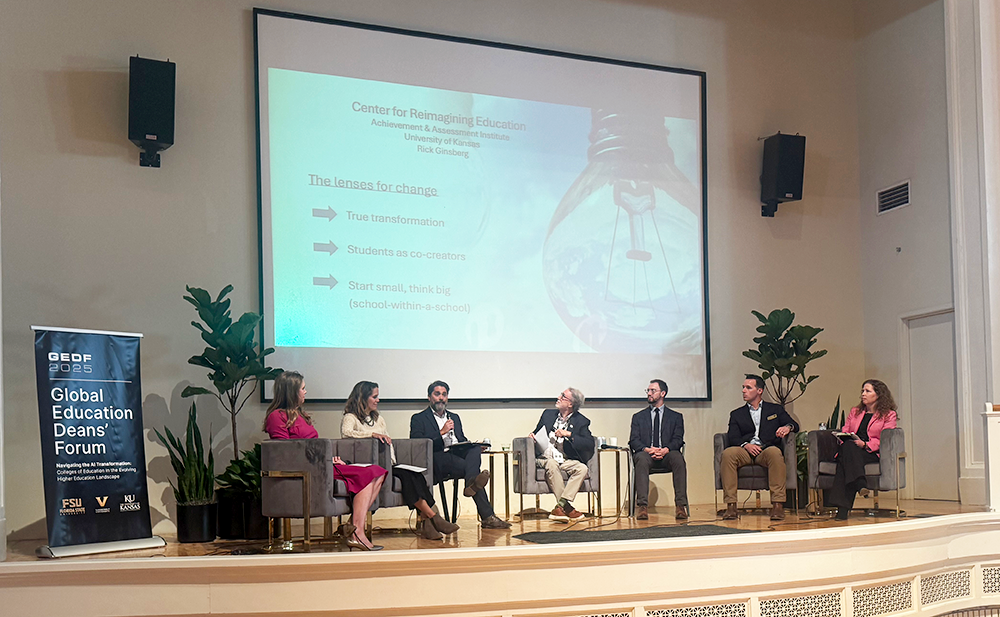 Garret Hall speaks as part of a panel