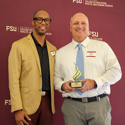 Jason Koerner and his award