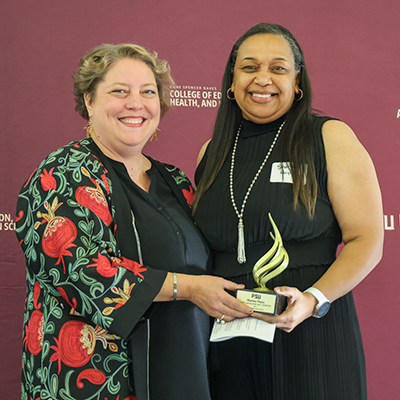 Sharima Hayes and her award