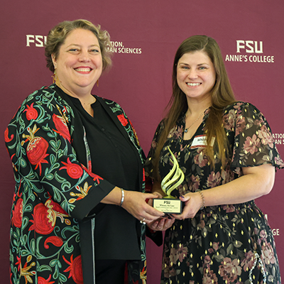 Whitney McCune and her award