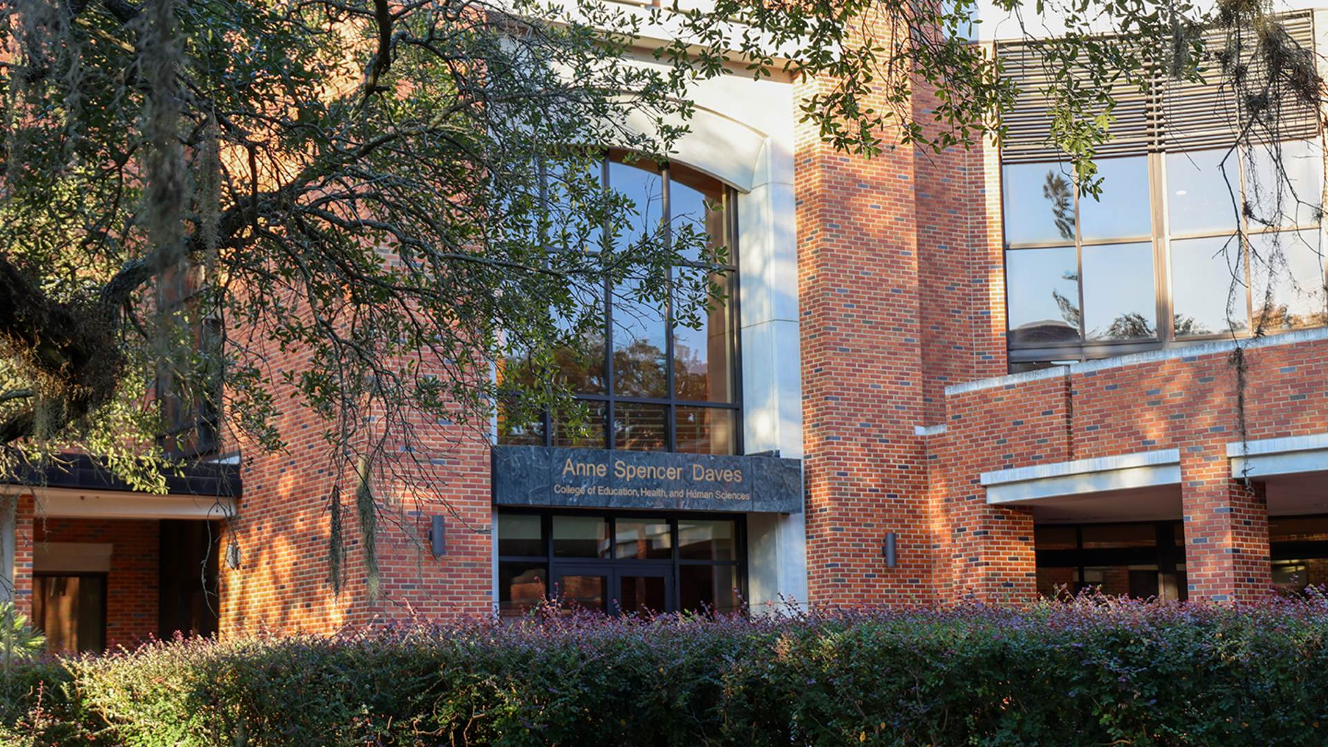 Exterior of the stone building at sunset