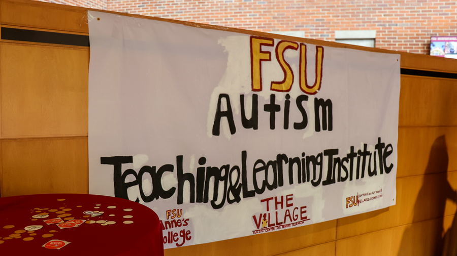 A hand-painted sign reads: FSU Autism Teaching & Learning Institute