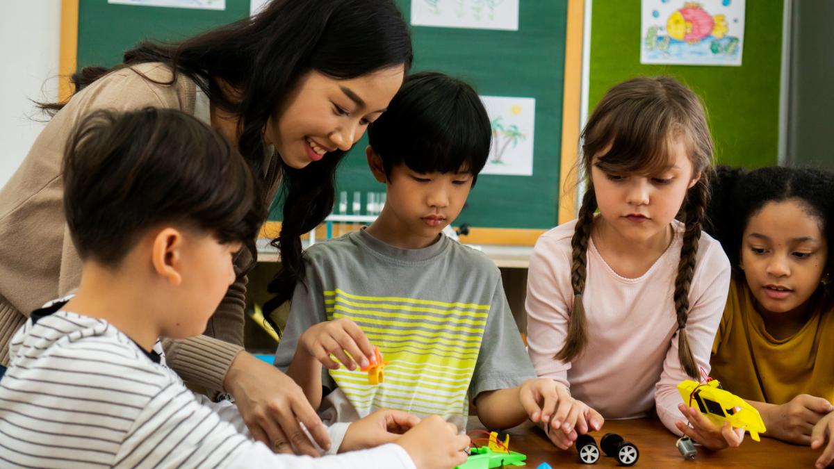 Teacher is teaching children