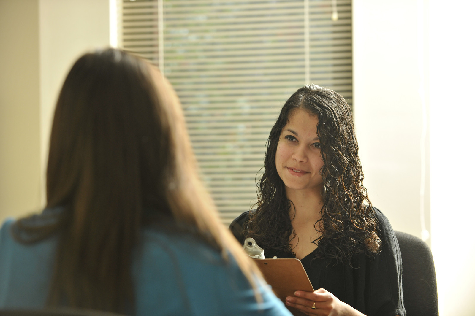 student talking to a counsel 