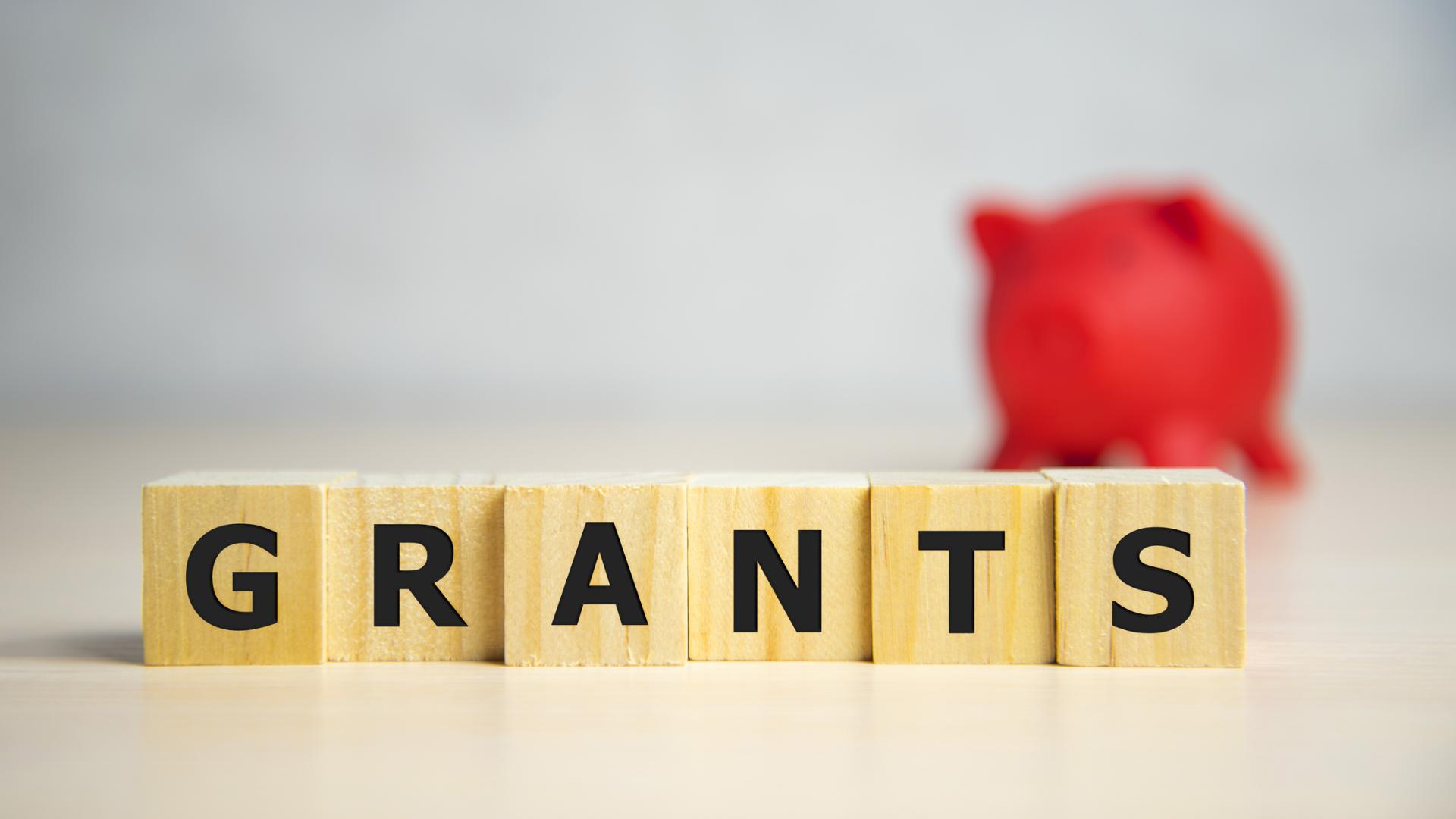 letter blocks spelling the word grants