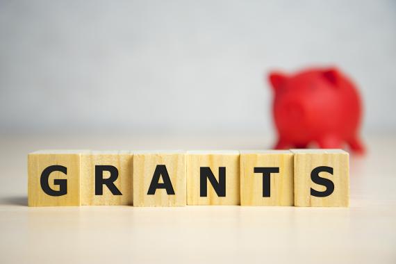 letter blocks spelling the word grants