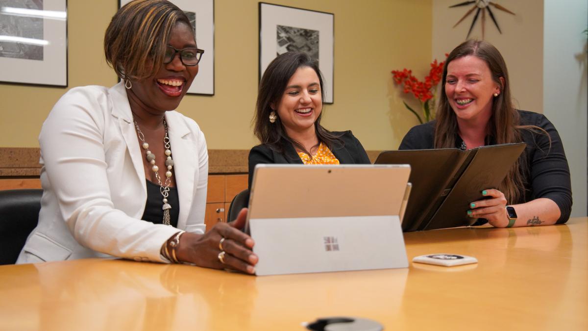 Education Policy students at a computer