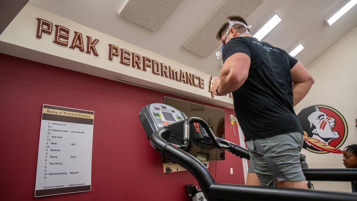 student running on treadmill