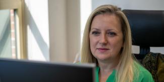 Woman looking at a computer