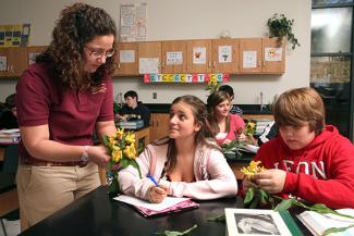 kids in a classroom with a teacher